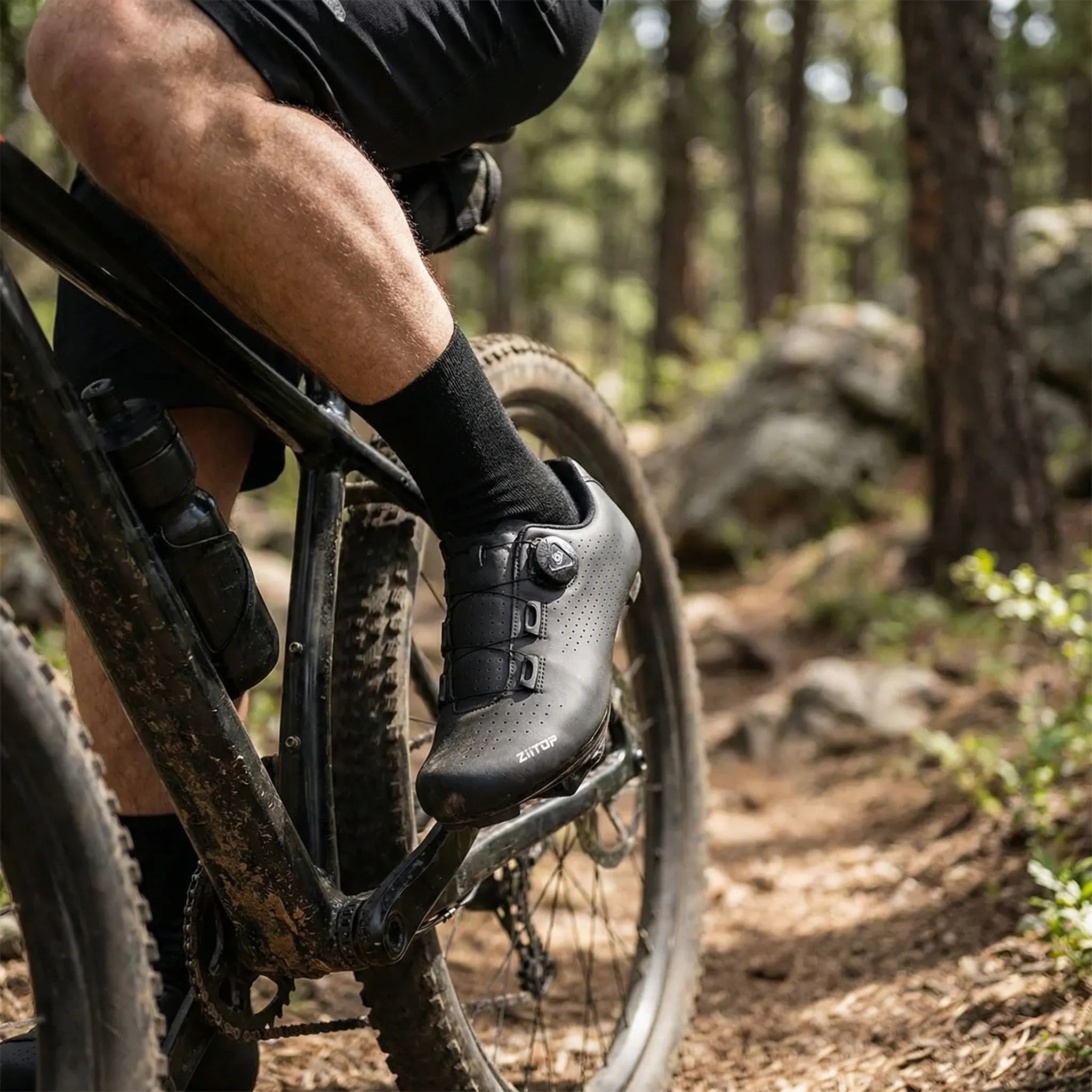 SPD-compatible cycling shoe with rotary dial closure and perforated upper