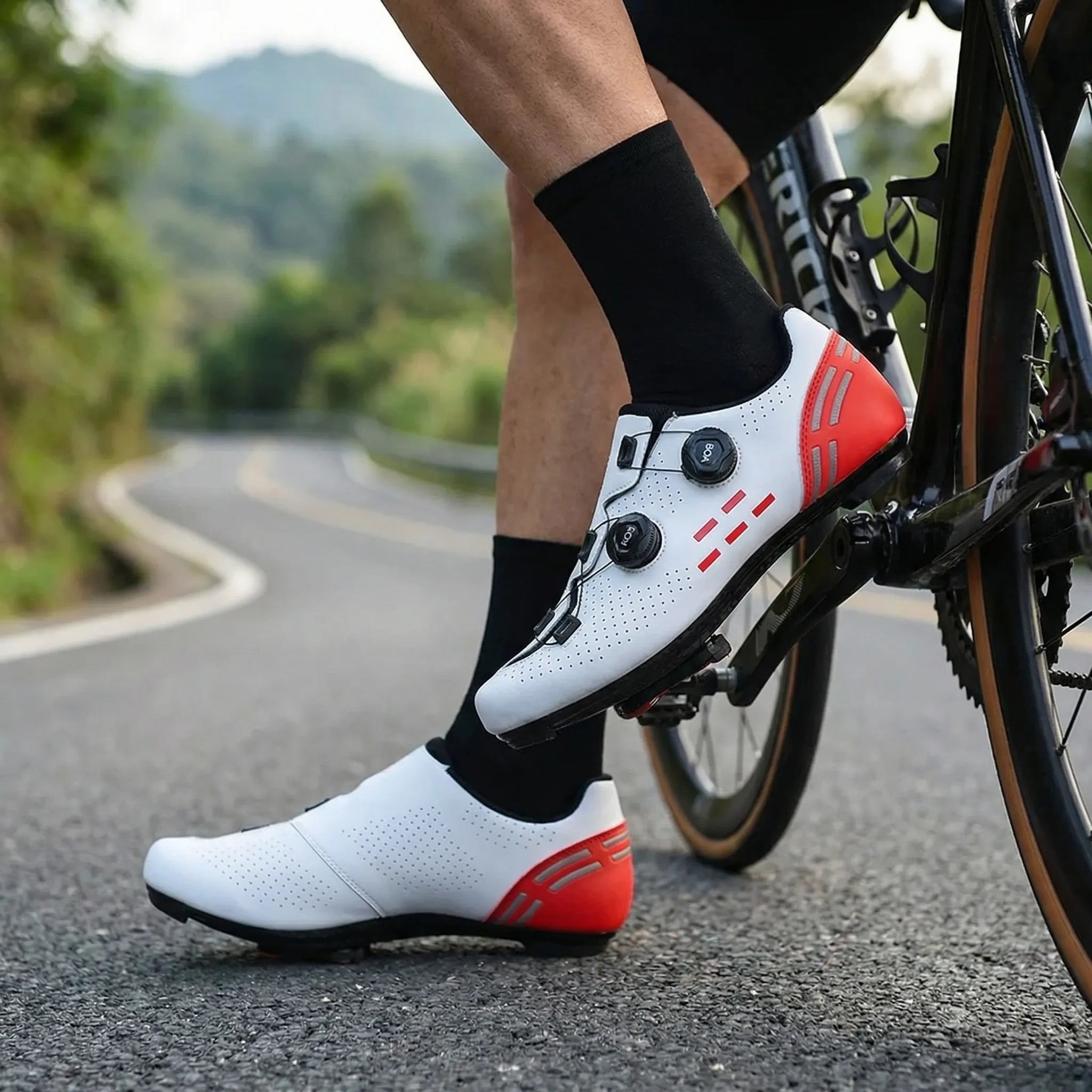 Dual-dial cycling shoe with perforated upper and non-slip sole for road and mountain biking