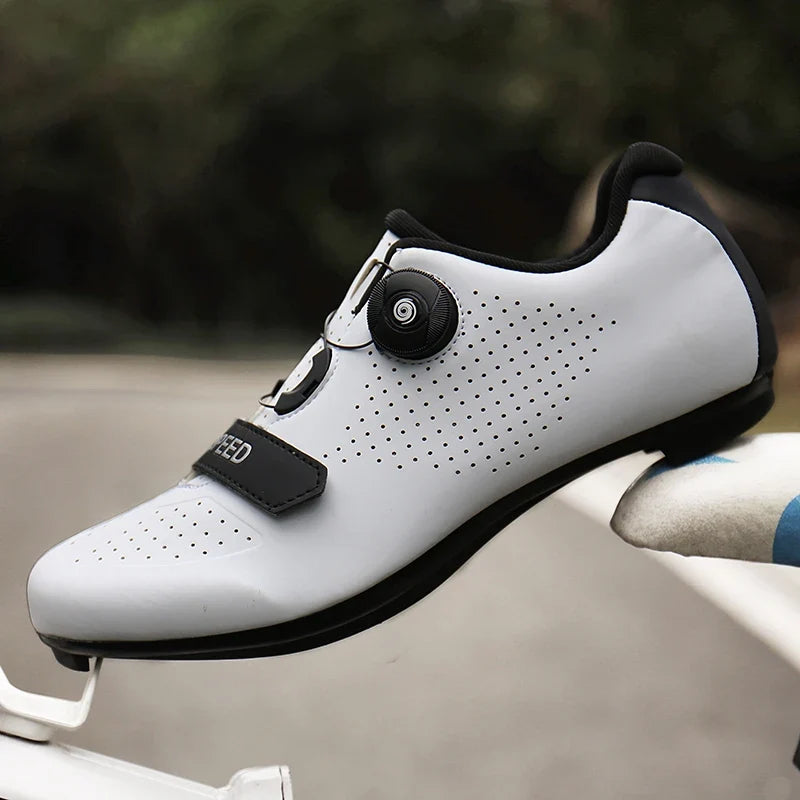 Mountain bike cycling shoe with self-locking cleat, rotary dial closure, breathable upper