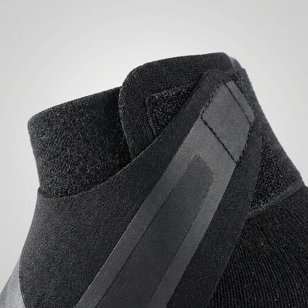Adjustable ankle support sleeve with anti-roll stability and breathable construction