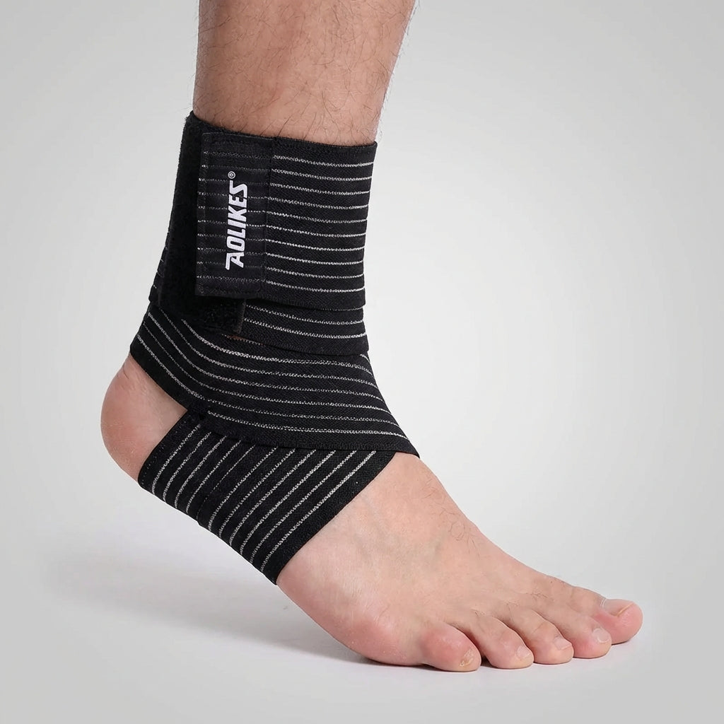 Adjustable ankle support wrap with targeted compression and breathable construction