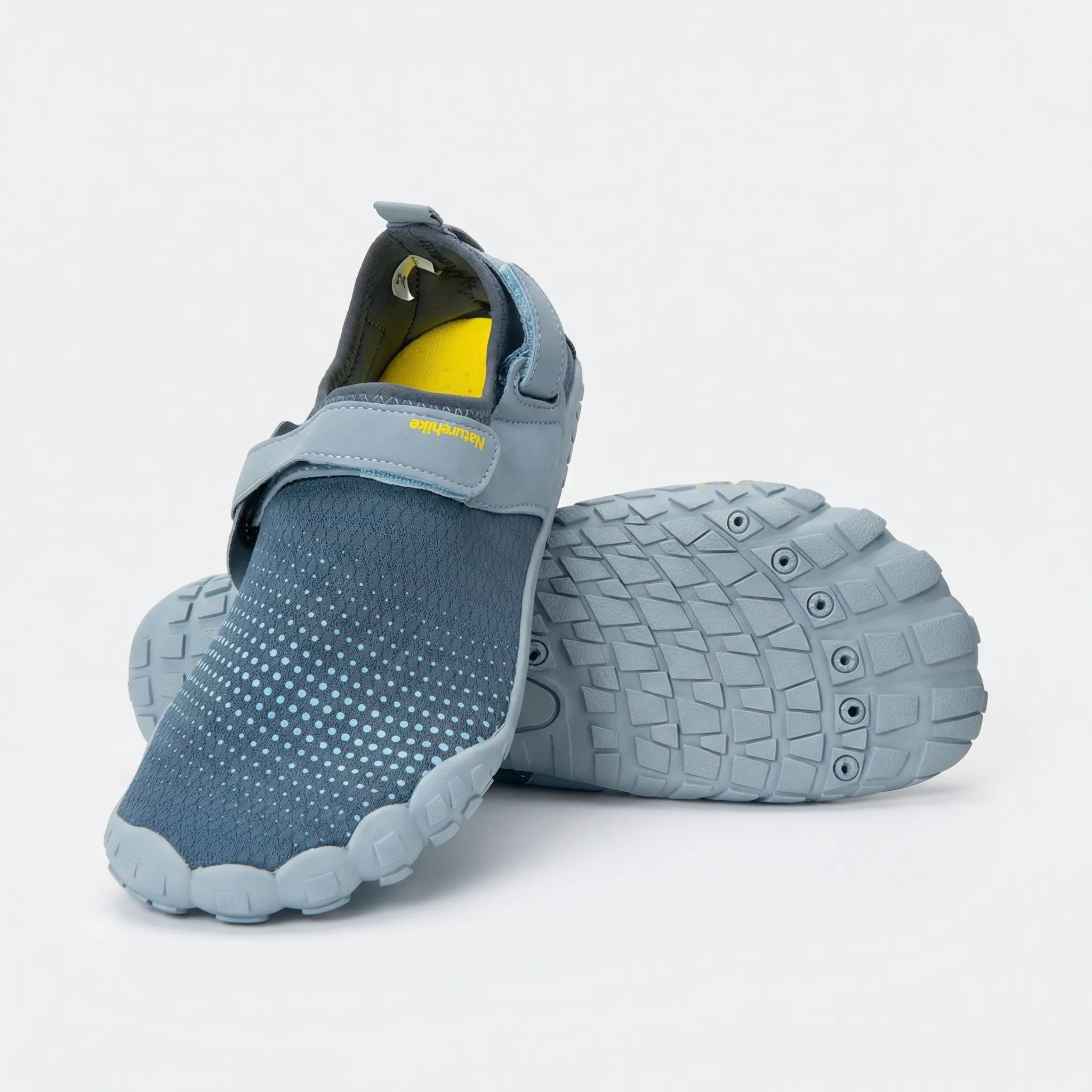 Quick-drying water shoes with non-slip sole, breathable mesh upper, and adjustable hook-and-loop strap