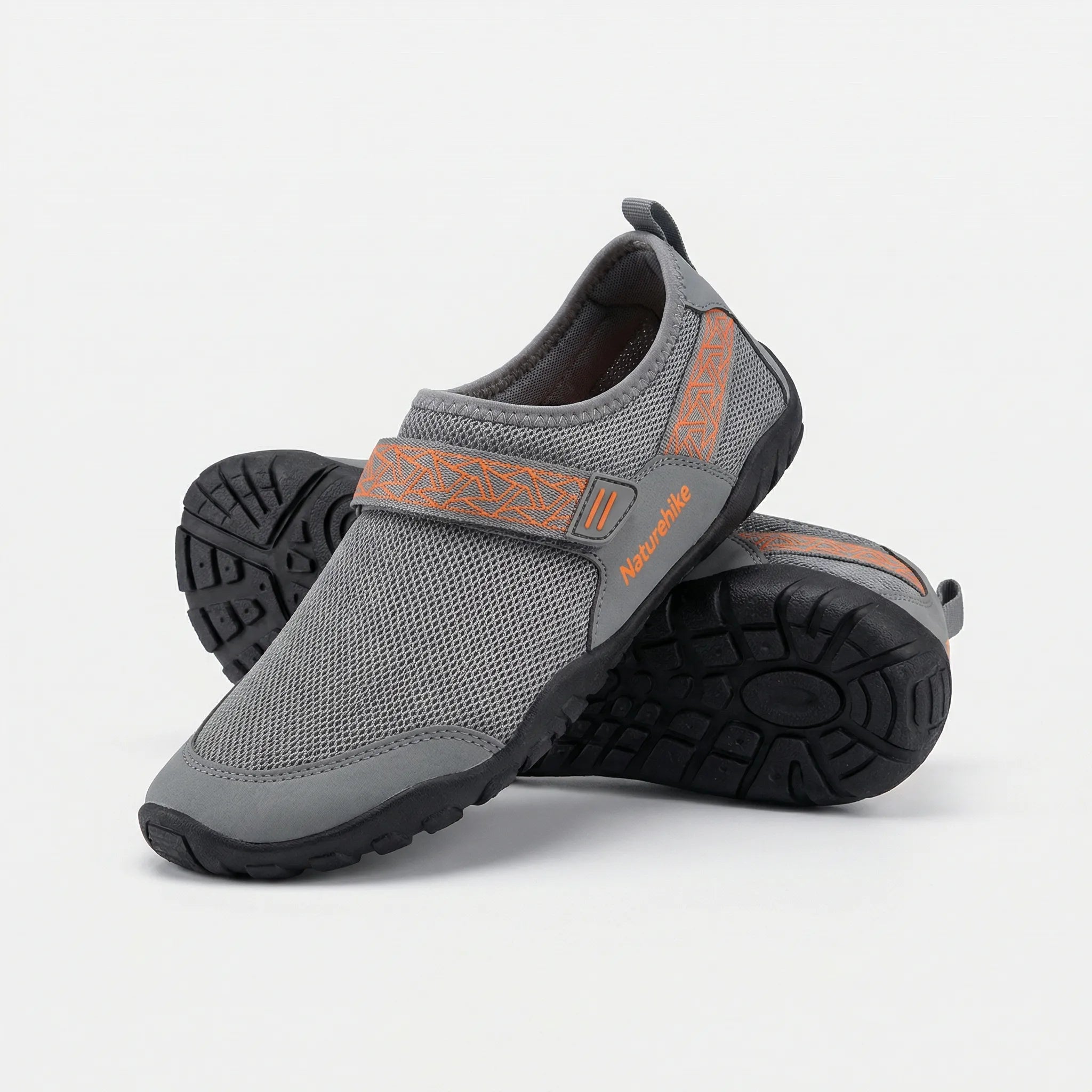 Quick-drying water shoes with non-slip sole, breathable mesh upper, and adjustable hook-and-loop strap