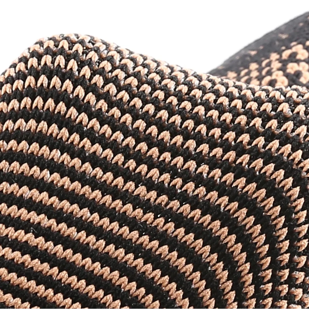 Compression ankle support sleeve with targeted reinforcement and breathable knitted construction