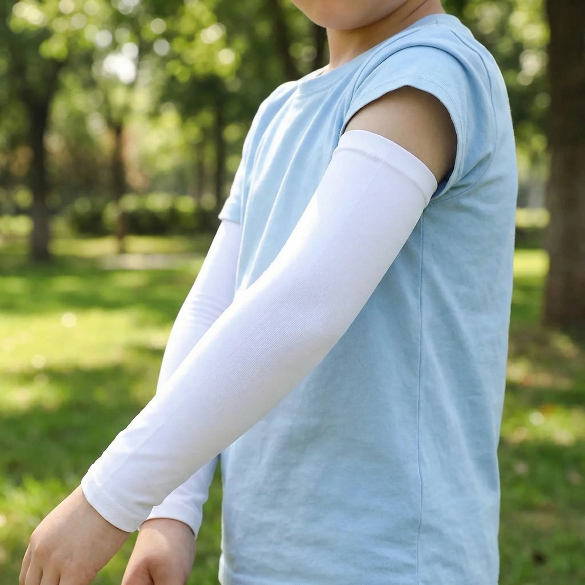Kids cooling arm sleeves with sun protection and breathable nylon construction