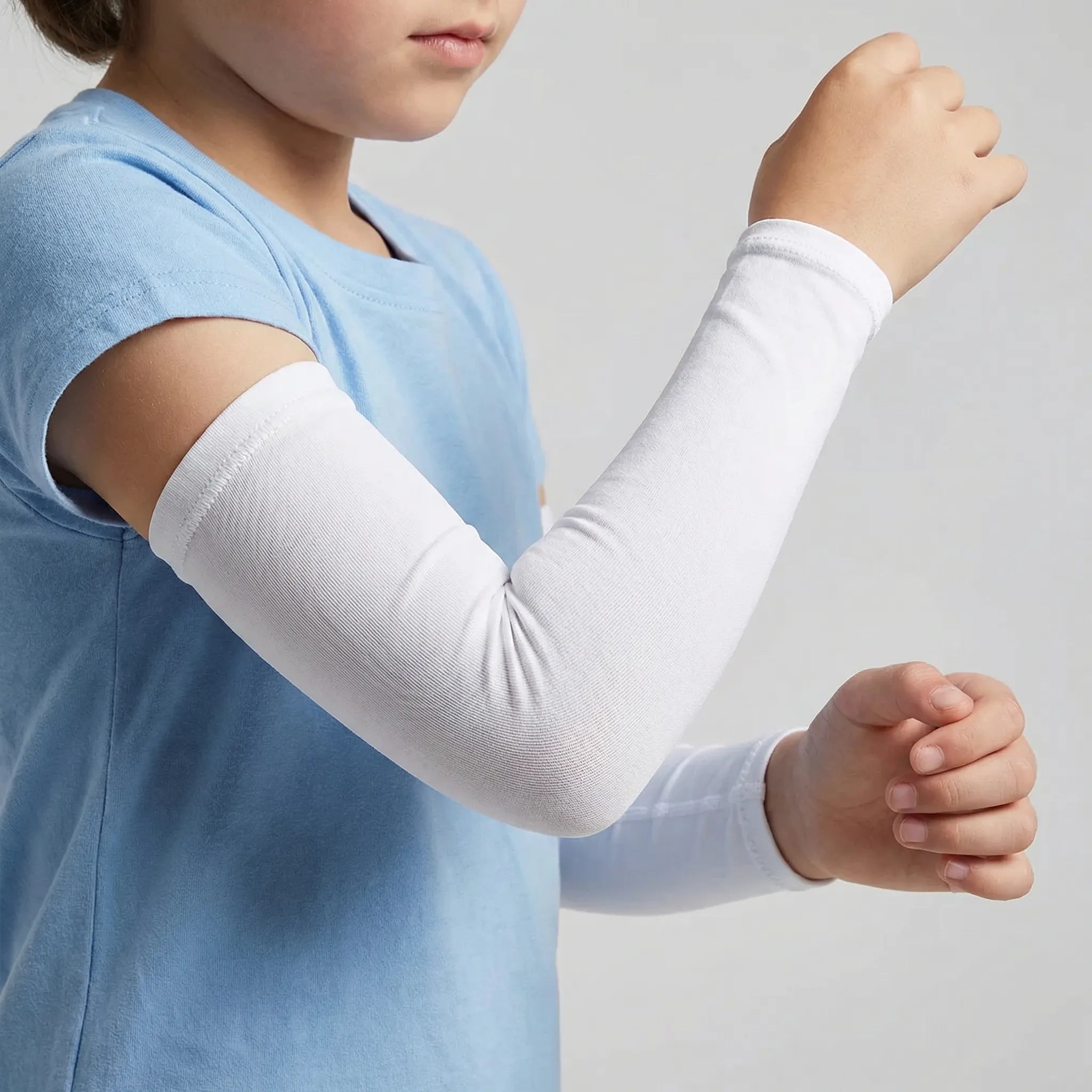 Kids cooling arm sleeves with sun protection and breathable nylon construction