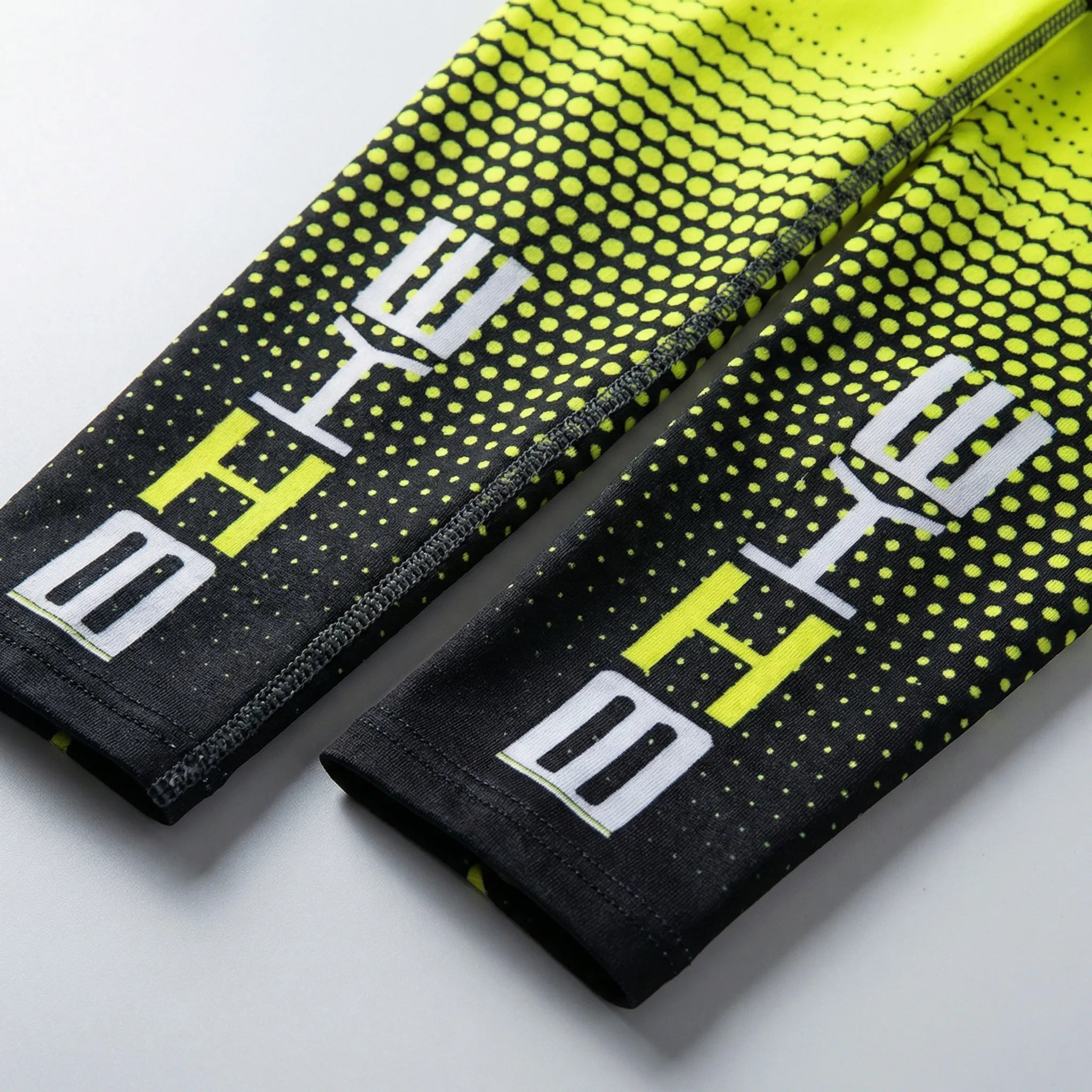Unisex cooling arm sleeves with sun protection and reflective accents