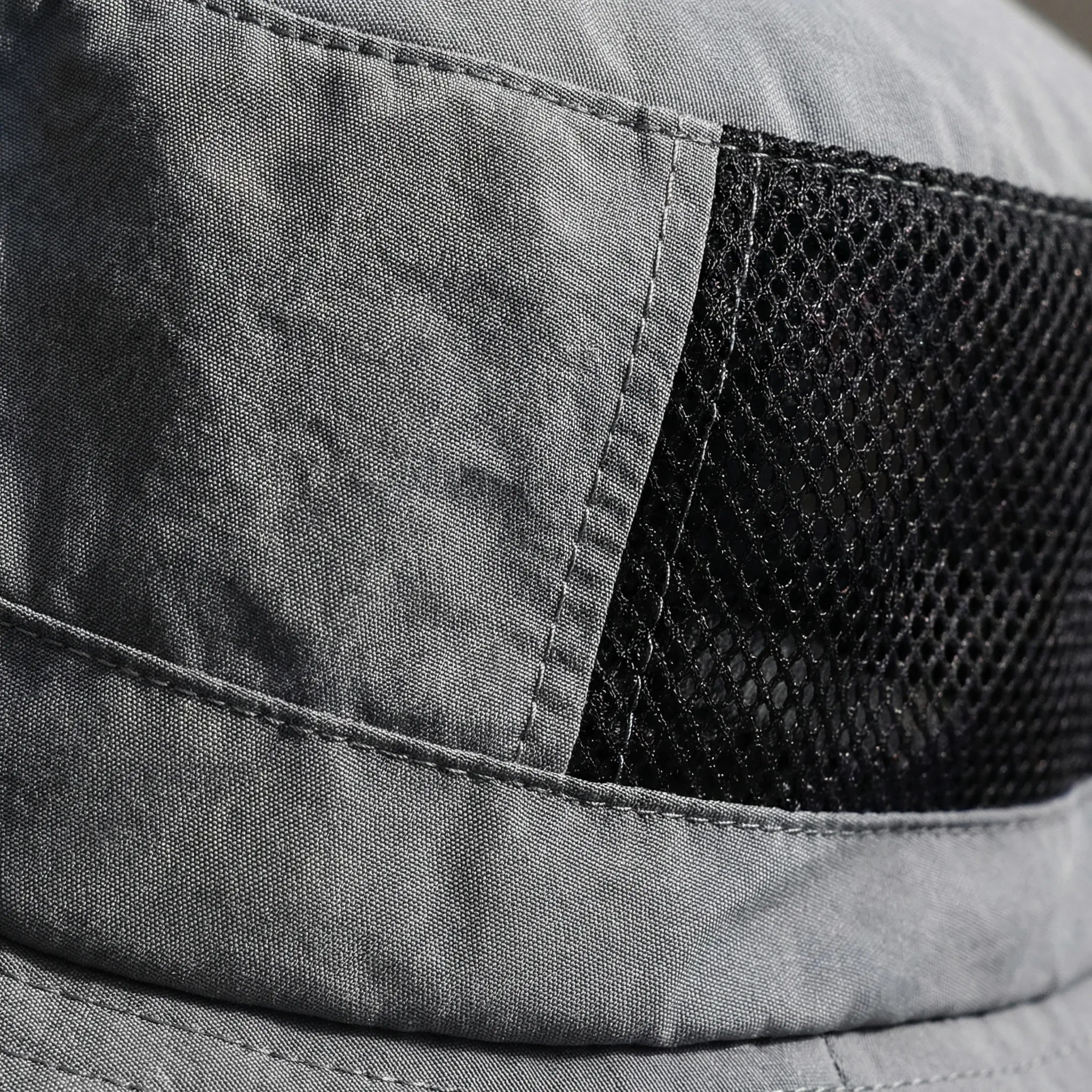 Mesh fishing hat with UPF50+ sun protection and adjustable chin strap