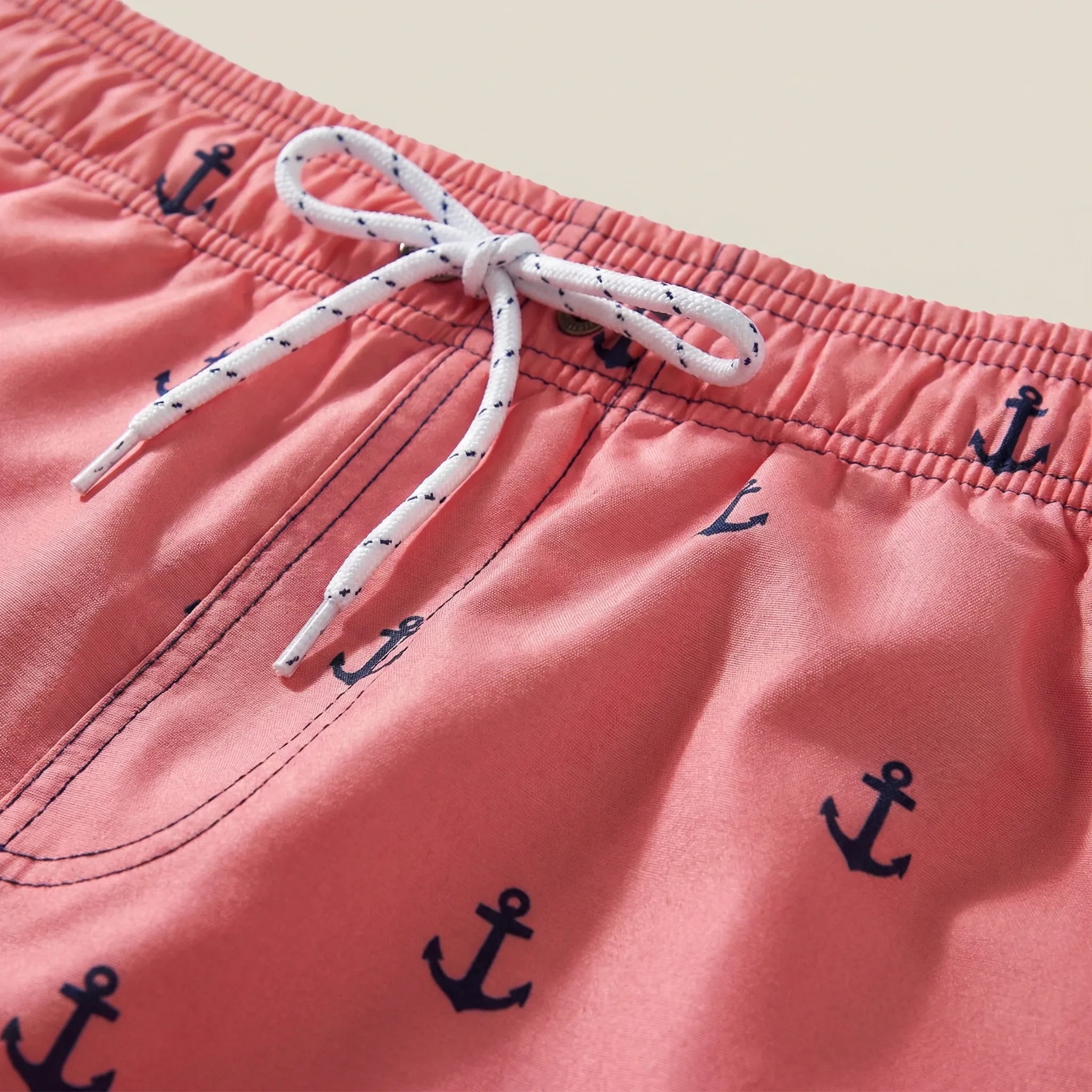 Men's short swim trunks with anchor print and adjustable drawstring