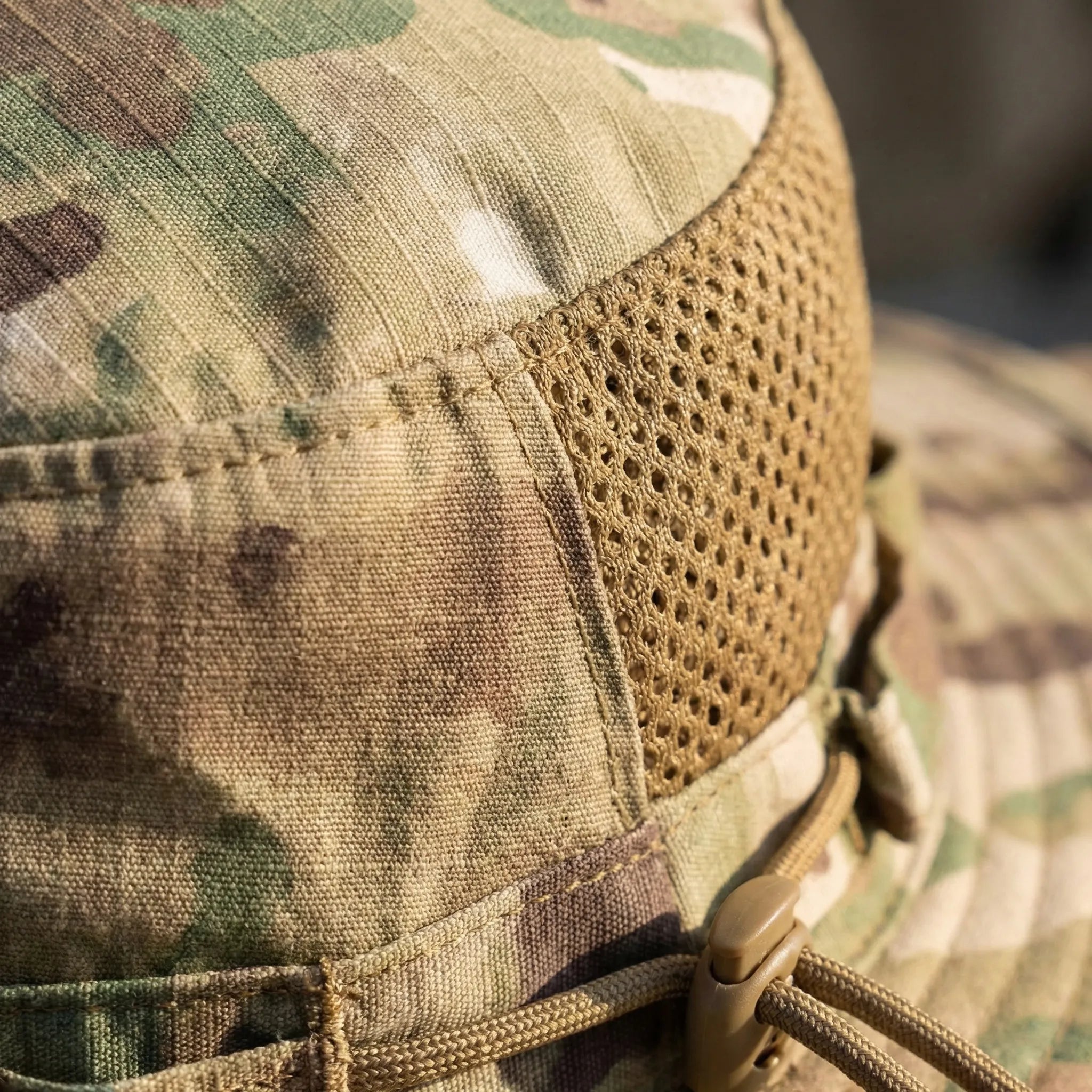 Wide-brim tactical boonie hat with mesh ventilation and adjustable chin cord