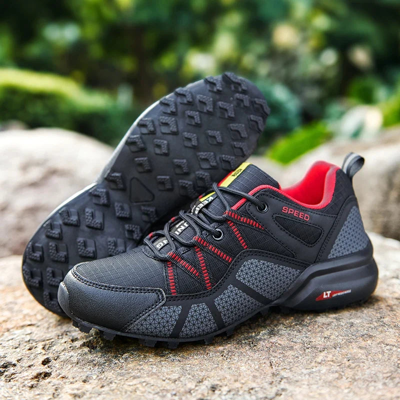Men's outdoor sneaker with multi-terrain lugged sole and reinforced toe cap