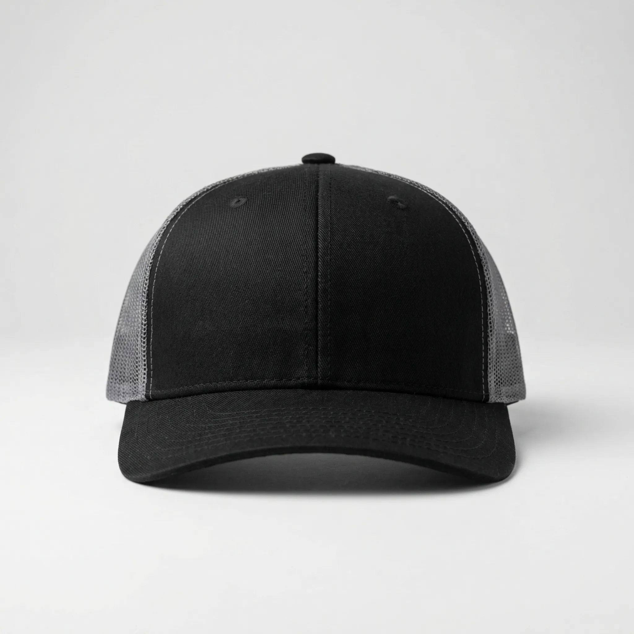 Unisex trucker cap with curved brim and breathable mesh back panel