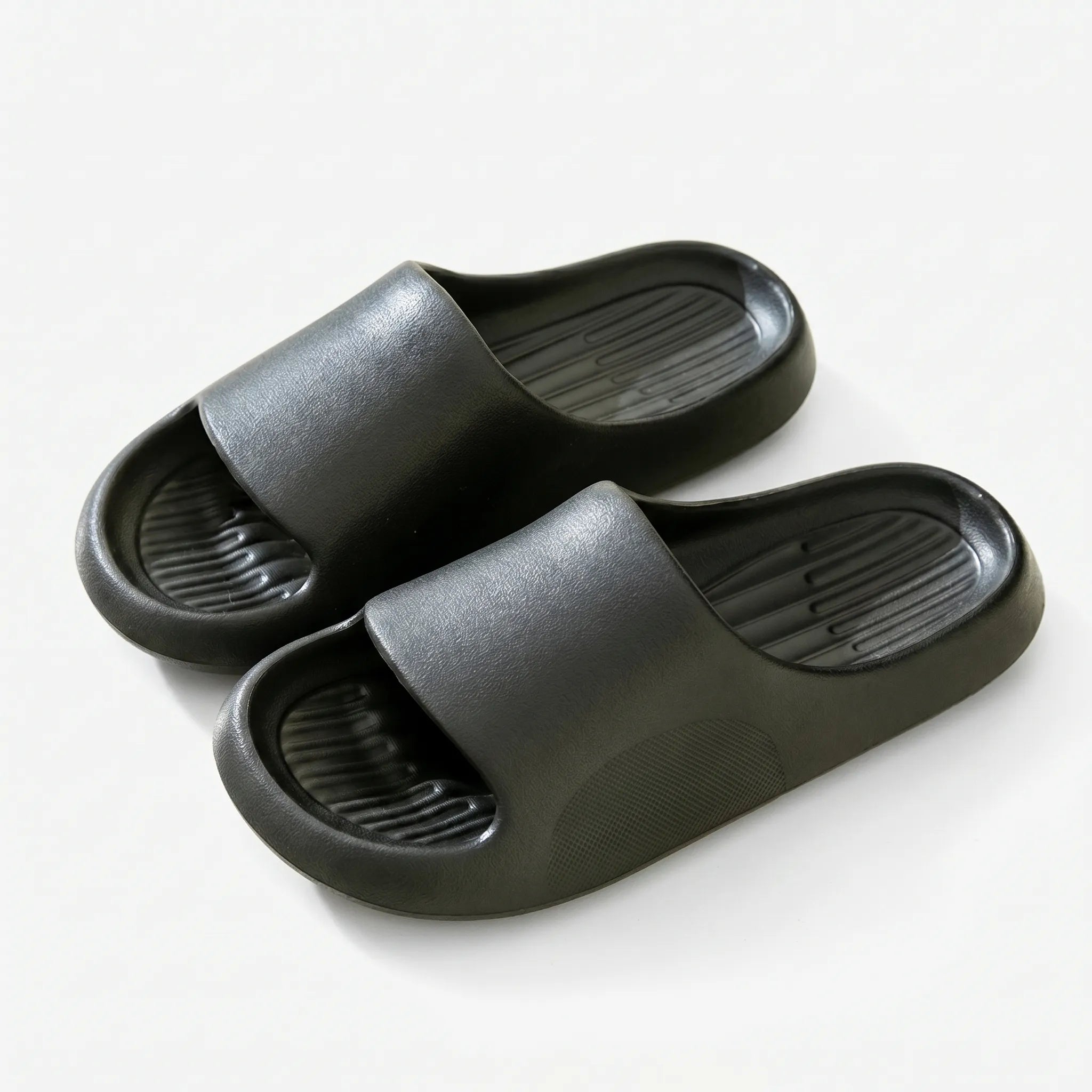 Chunky clog slippers with thick platform sole, open toe design, structured footbed