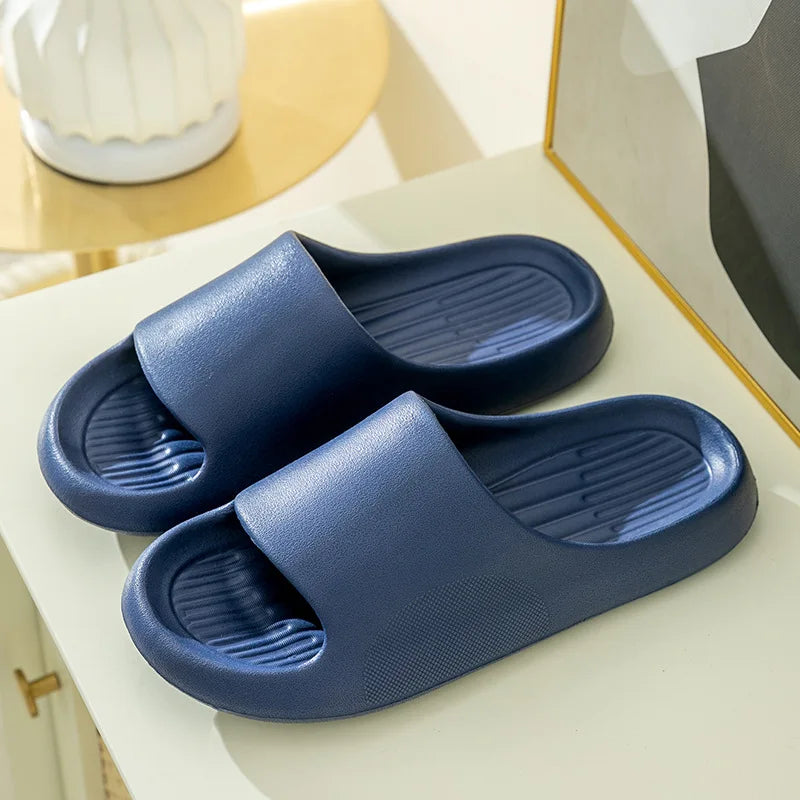 Chunky clog slippers with thick platform sole, open toe design, structured footbed