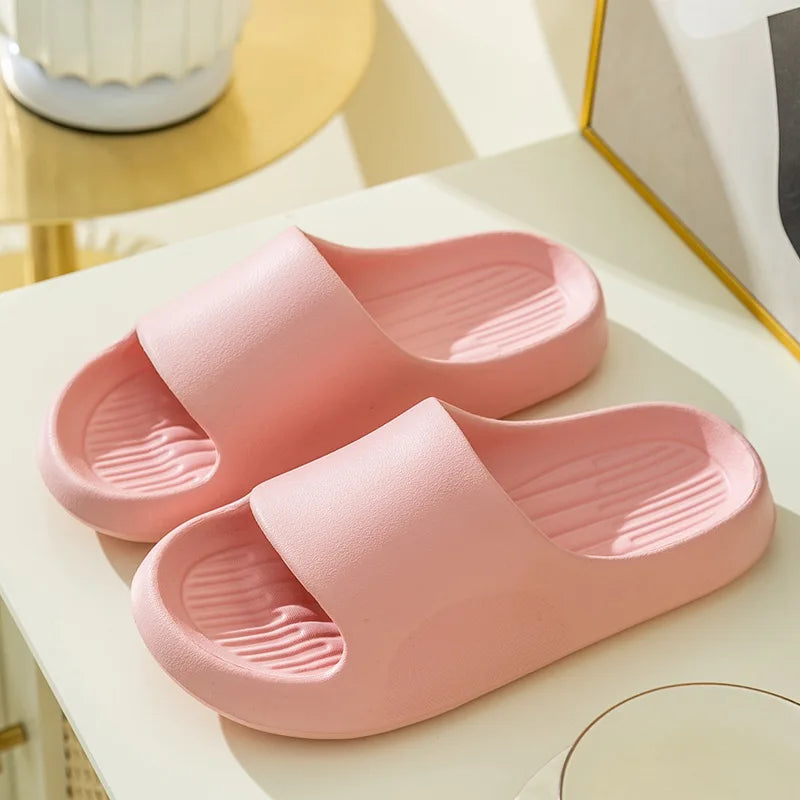 Chunky clog slippers with thick platform sole, open toe design, structured footbed