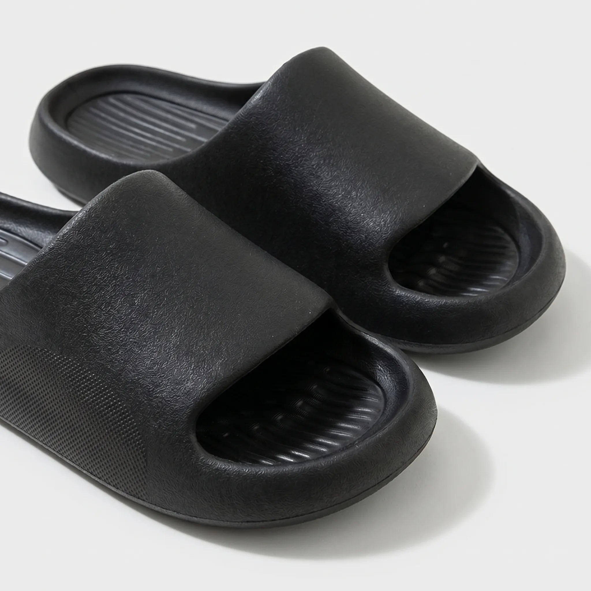 Chunky clog slippers with thick platform sole, open toe design, structured footbed