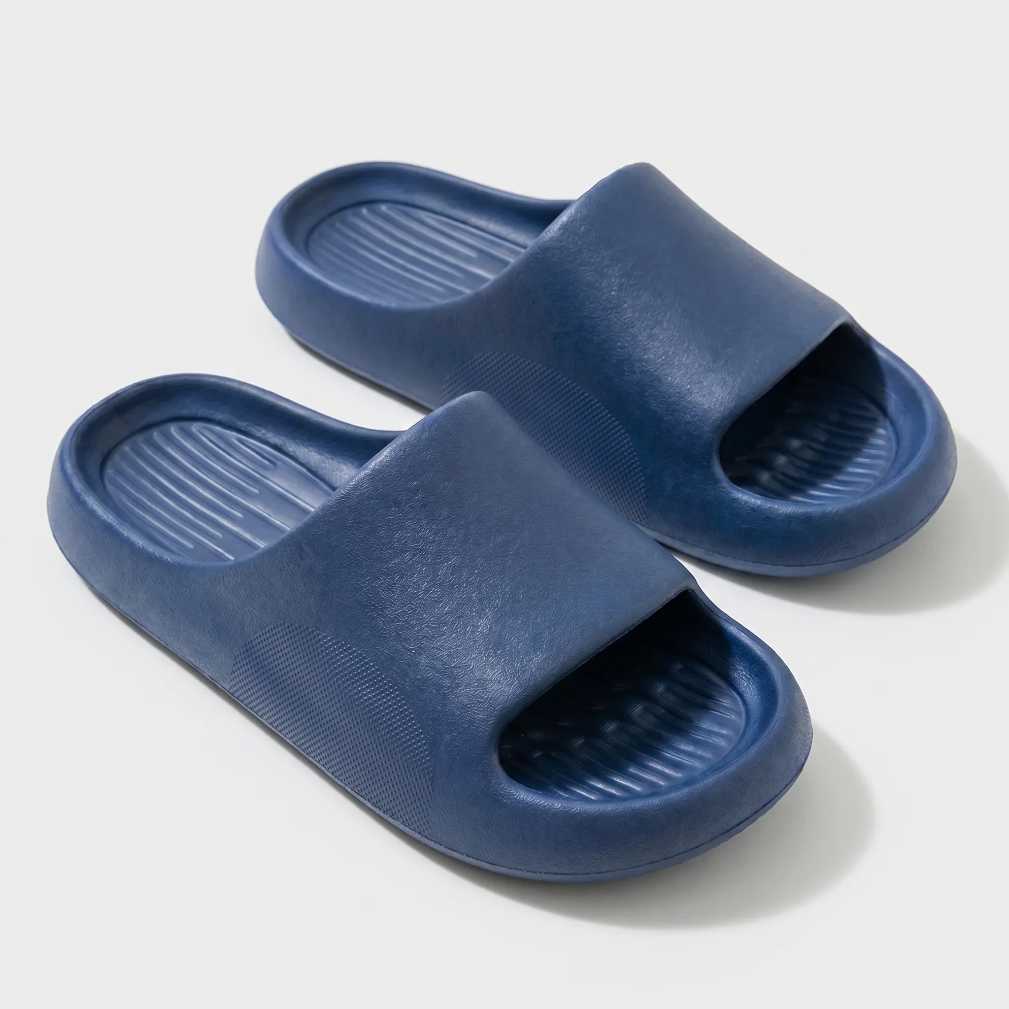 Chunky clog slippers with thick platform sole, open toe design, structured footbed