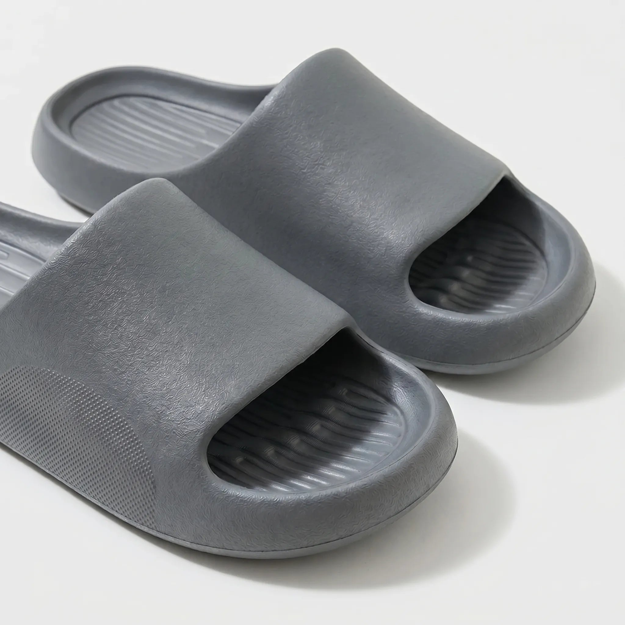 Chunky clog slippers with thick platform sole, open toe design, structured footbed