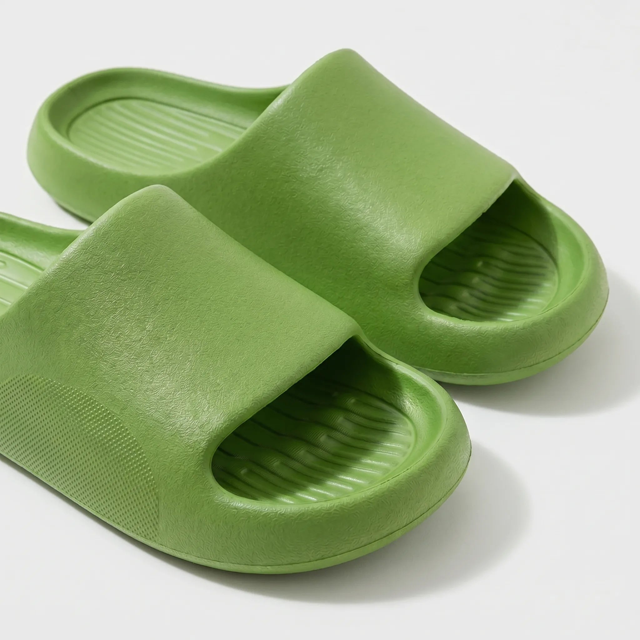 Chunky clog slippers with thick platform sole, open toe design, structured footbed