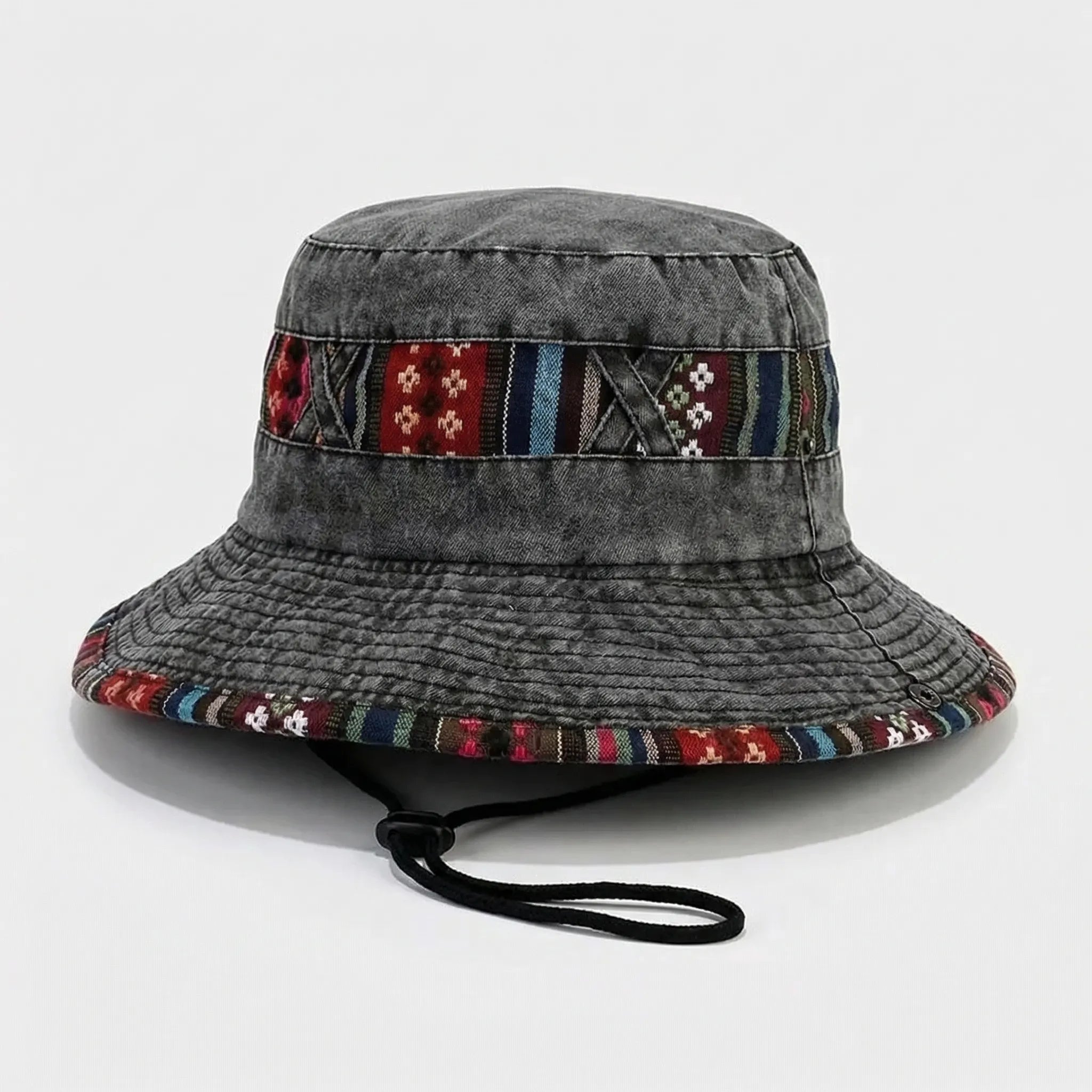 Wide-brim bucket hat with boho woven trim and adjustable chin cord
