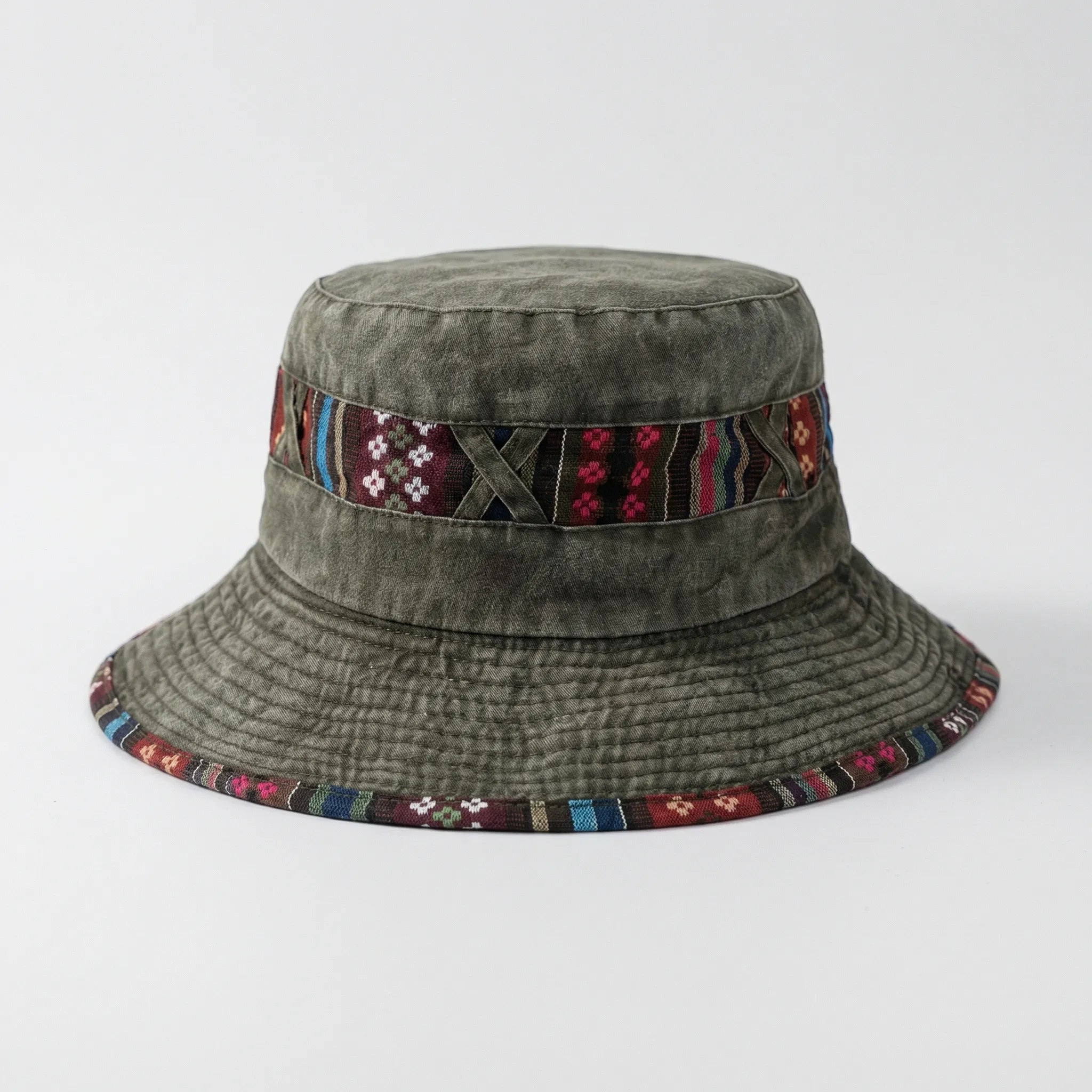 Wide-brim bucket hat with boho woven trim and adjustable chin cord