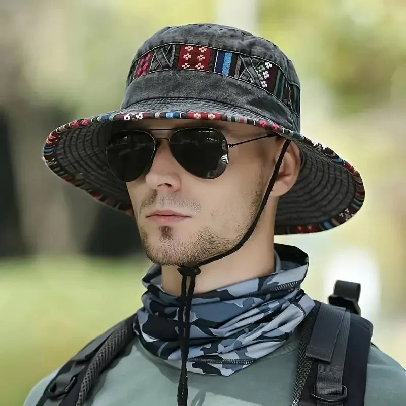 Wide-brim bucket hat with boho woven trim and adjustable chin cord