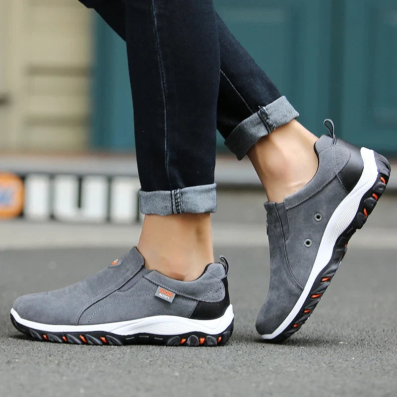 Men's slip-on walking shoe with breathable perforated upper and cushioned flat sole