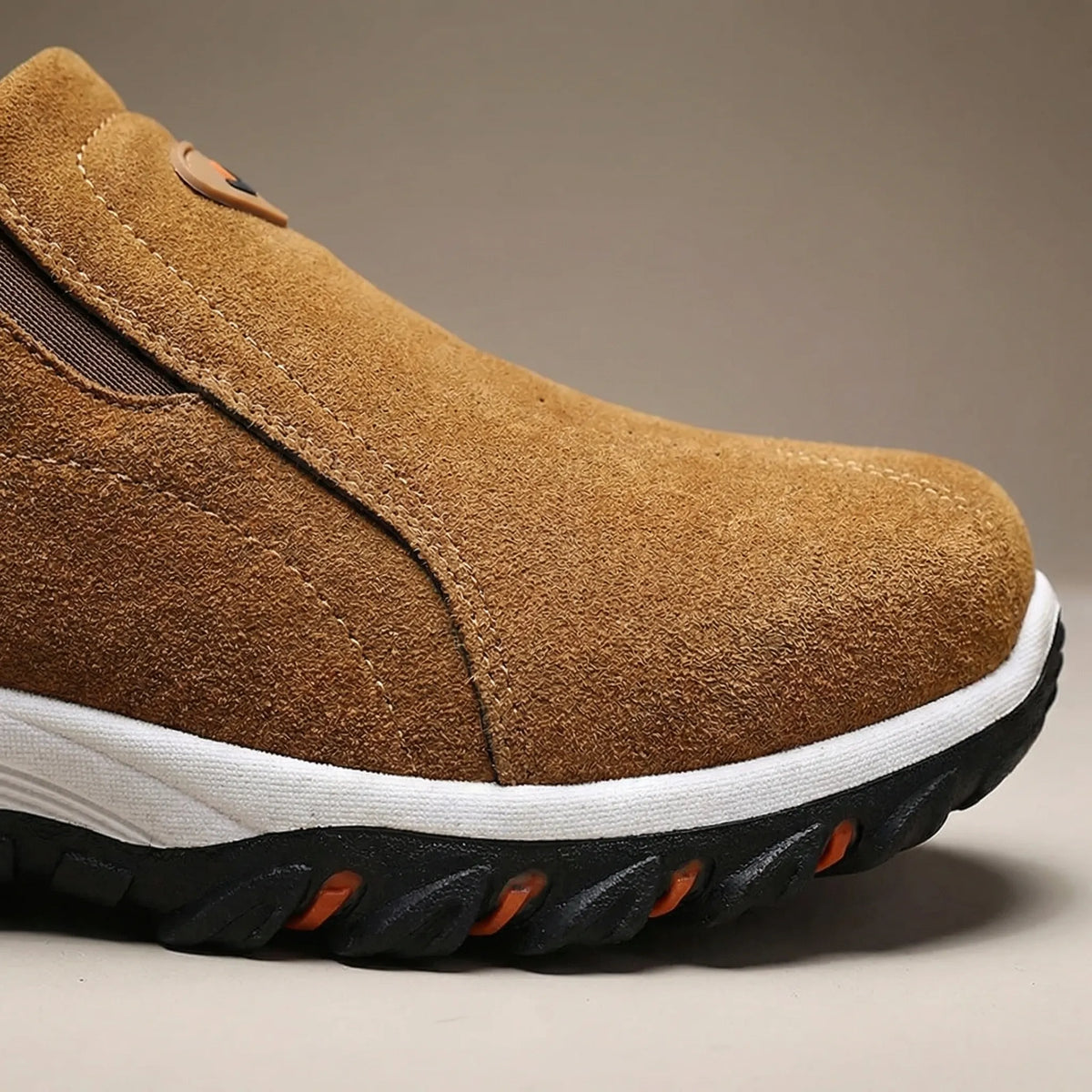 Men's slip-on walking shoe with breathable perforated upper and cushioned flat sole