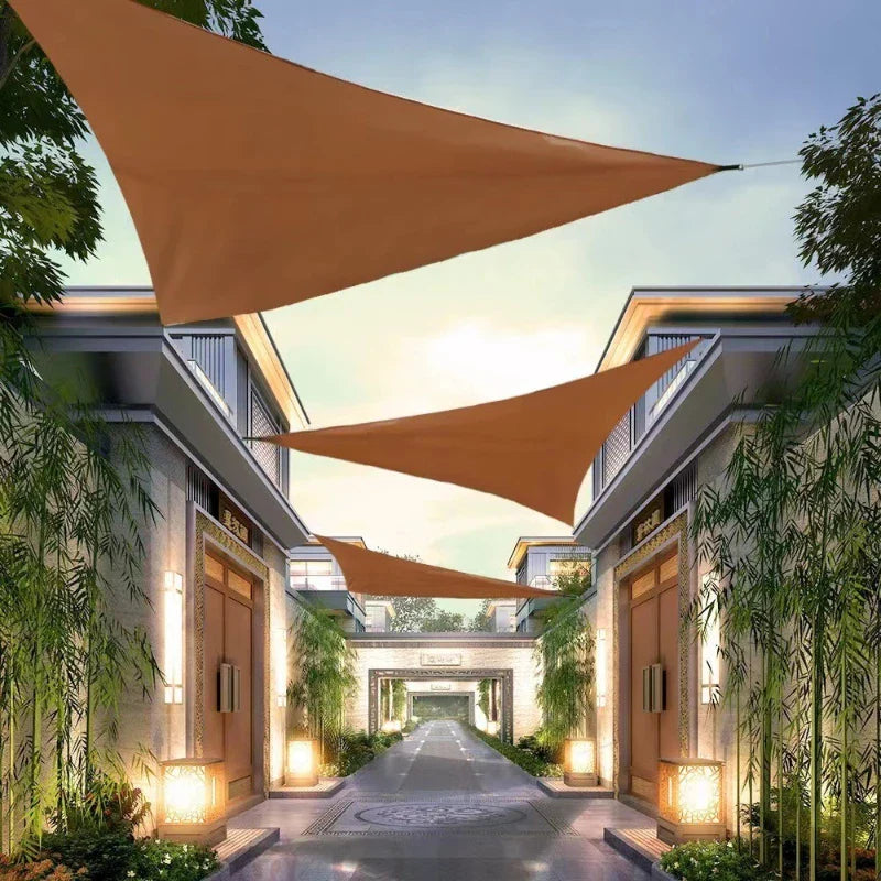 Triangular folding shade sail with reinforced corners for patio and campsite coverage