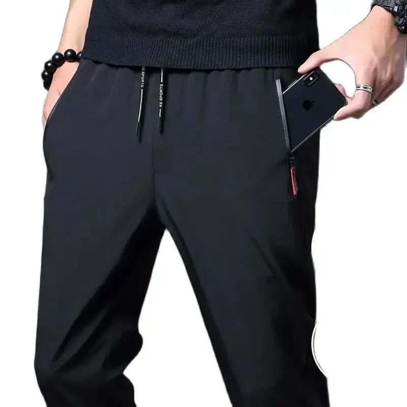 Men's slim straight jogger pants with elastic waistband and zip pockets