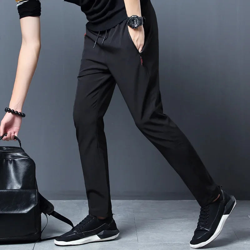 Men's slim straight jogger pants with elastic waistband and zip pockets