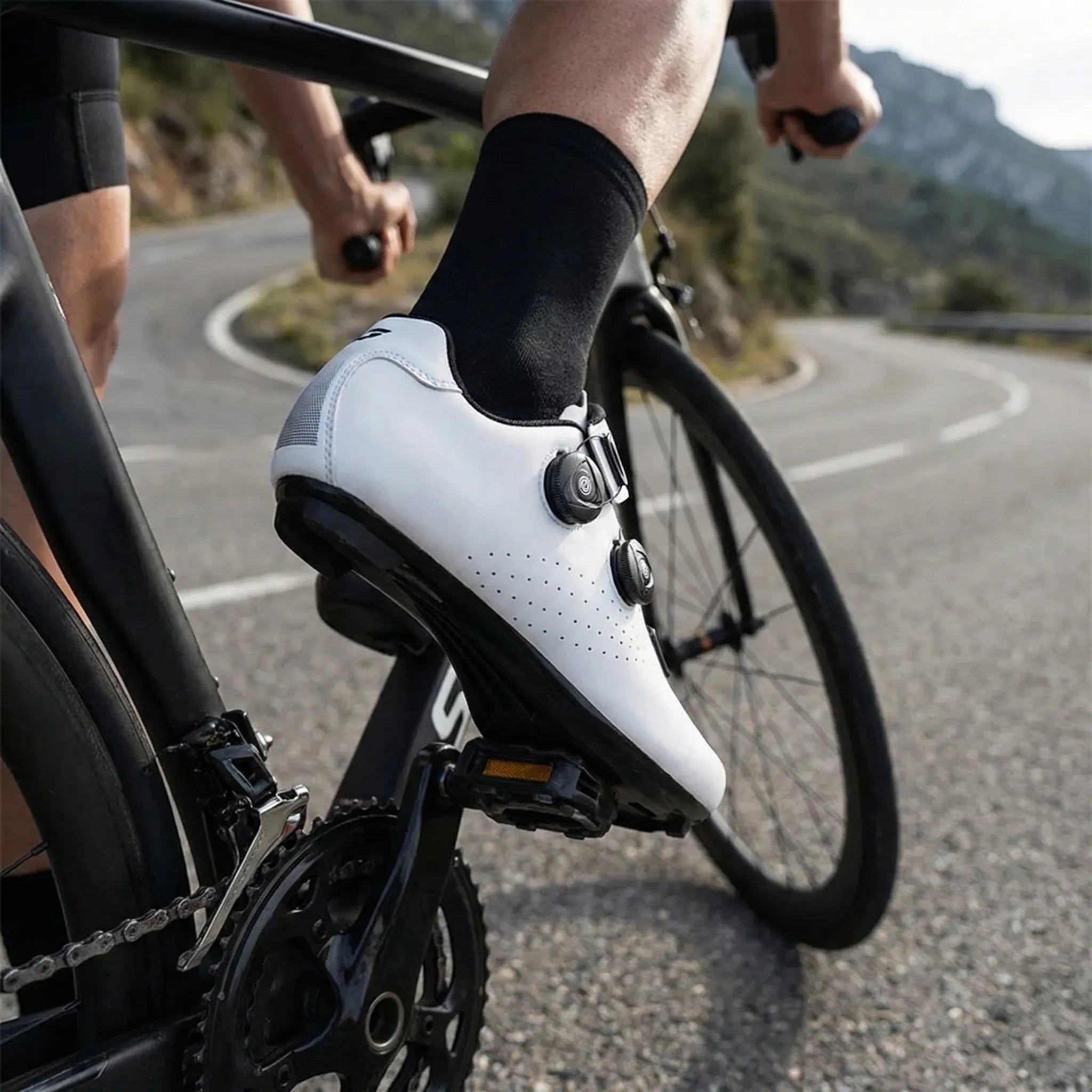 Dual dial cycling shoe with breathable upper and adjustable fit for road and mountain biking