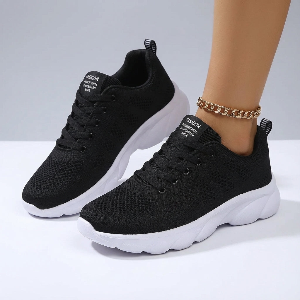 Women's low cut sport shoe with breathable mesh upper and cushioned sole