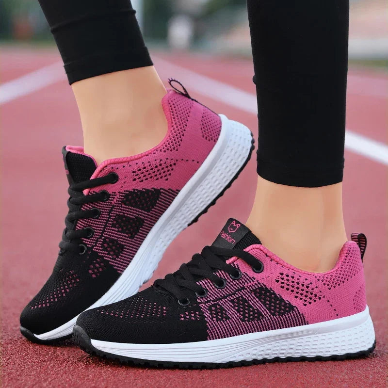 Women's low cut sport shoe with breathable mesh upper and cushioned sole