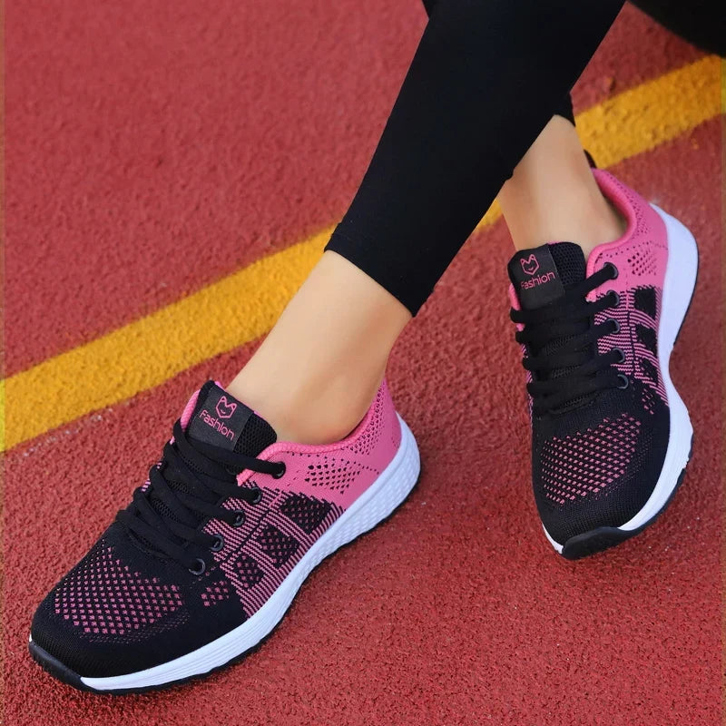 Women's low cut sport shoe with breathable mesh upper and cushioned sole