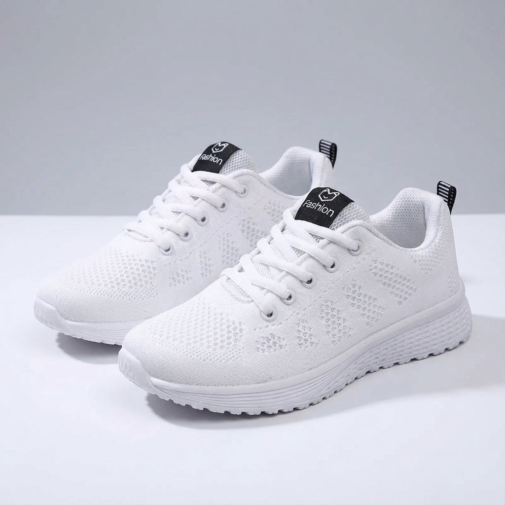 Women's low cut sport shoe with breathable mesh upper and cushioned sole