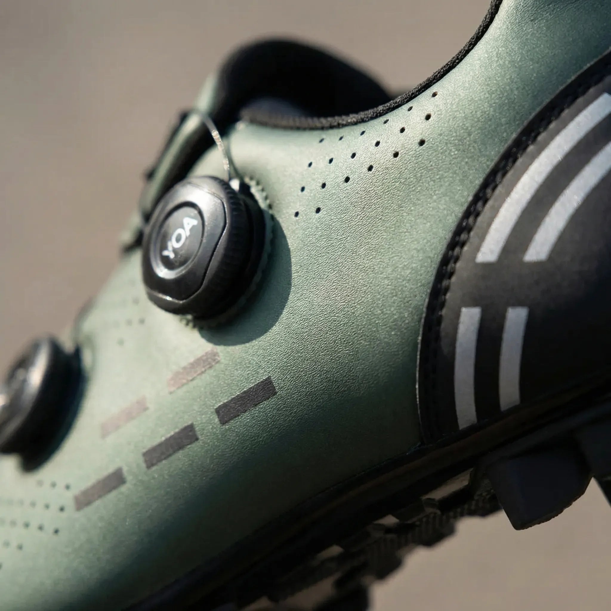 Men's dual-purpose cycling shoe with rotary dial closure and perforated upper
