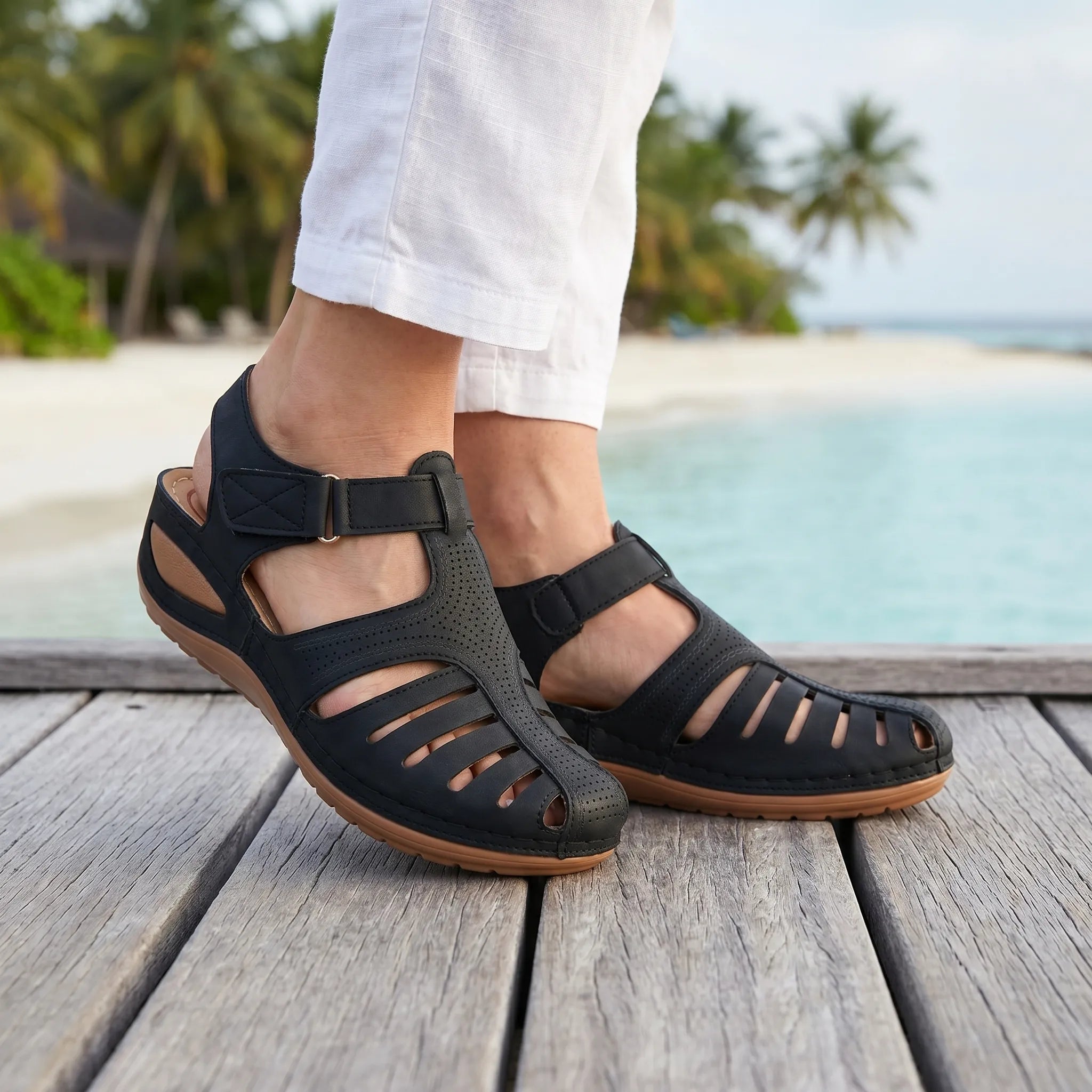 Women's summer sandal with low wedge heel, adjustable strap, and wide toe box