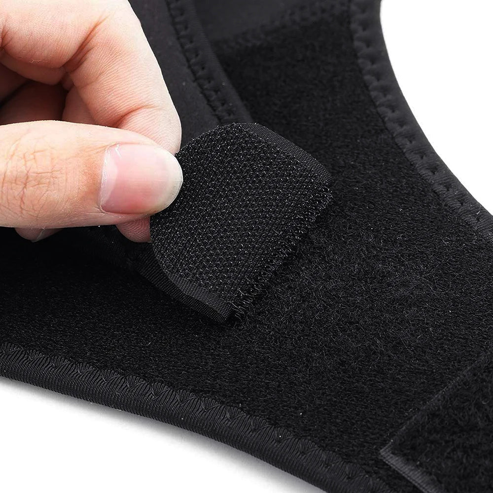 Adjustable compression shoulder brace with reinforced wrap design