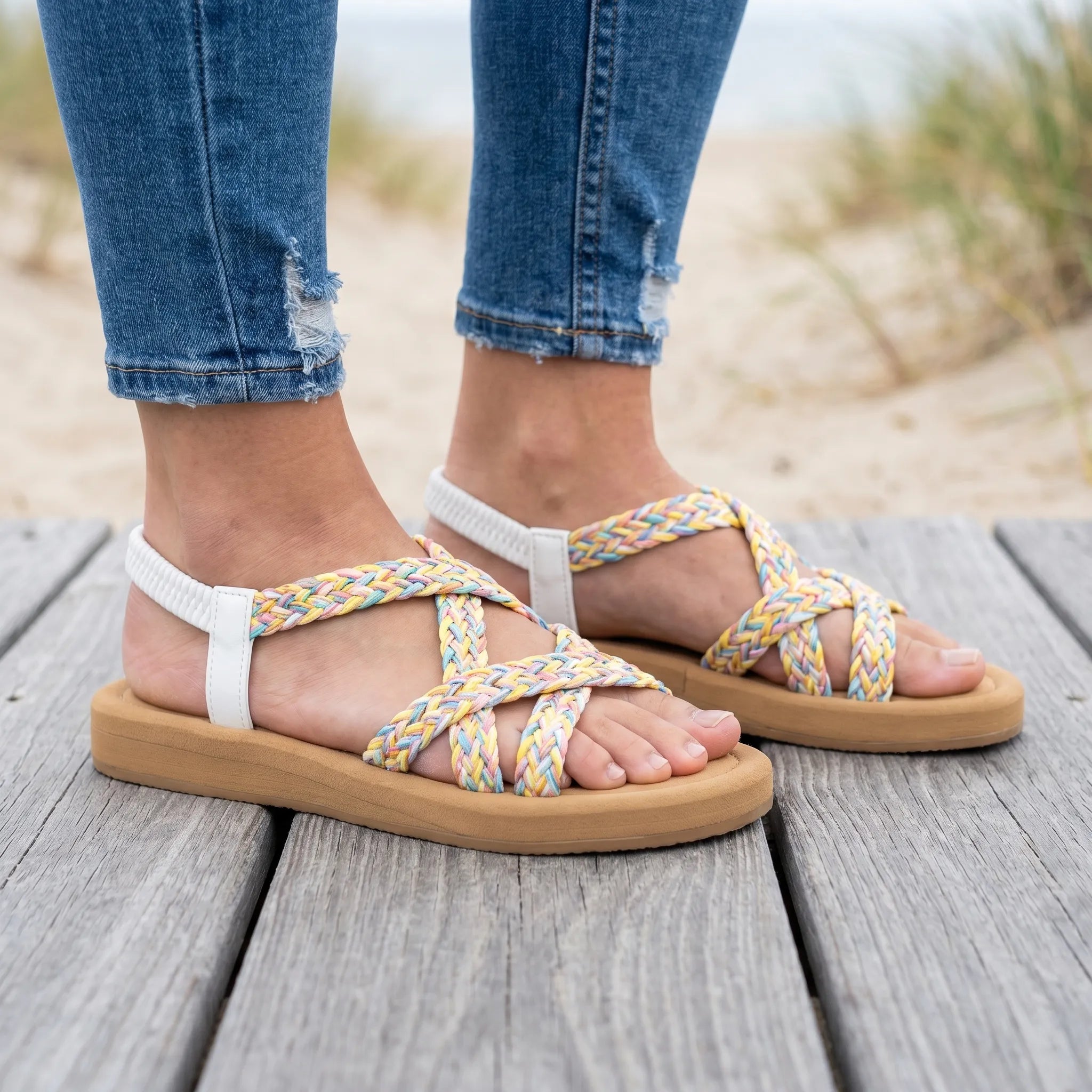 Women's flat summer sandals with multicolor braided woven straps