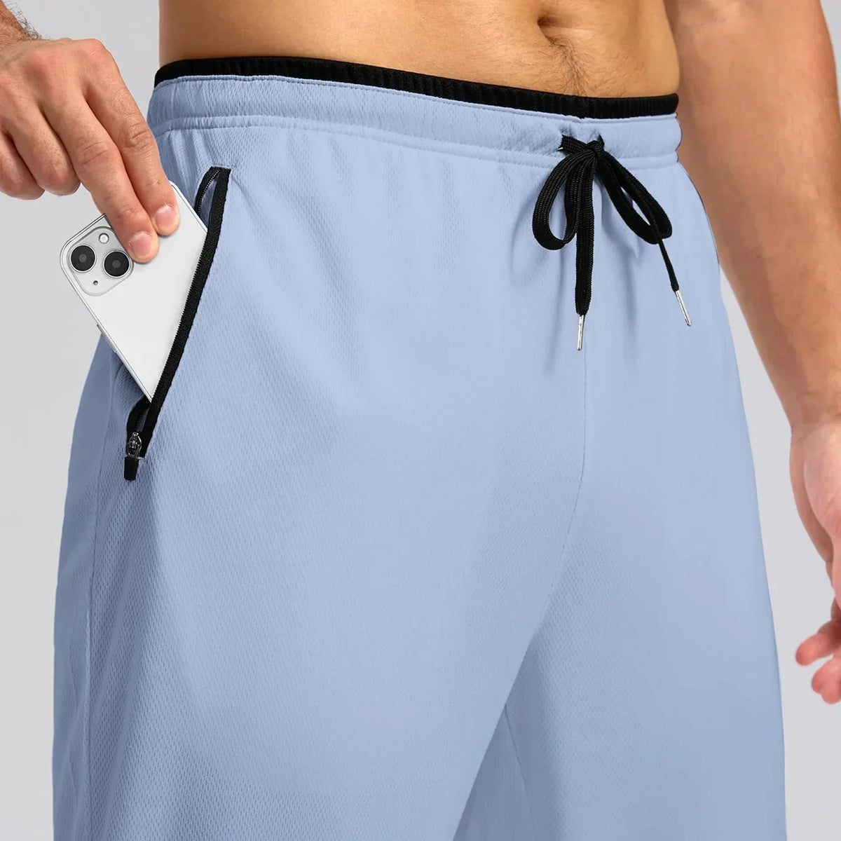 Men's athletic joggers with elastic waistband and zip pockets