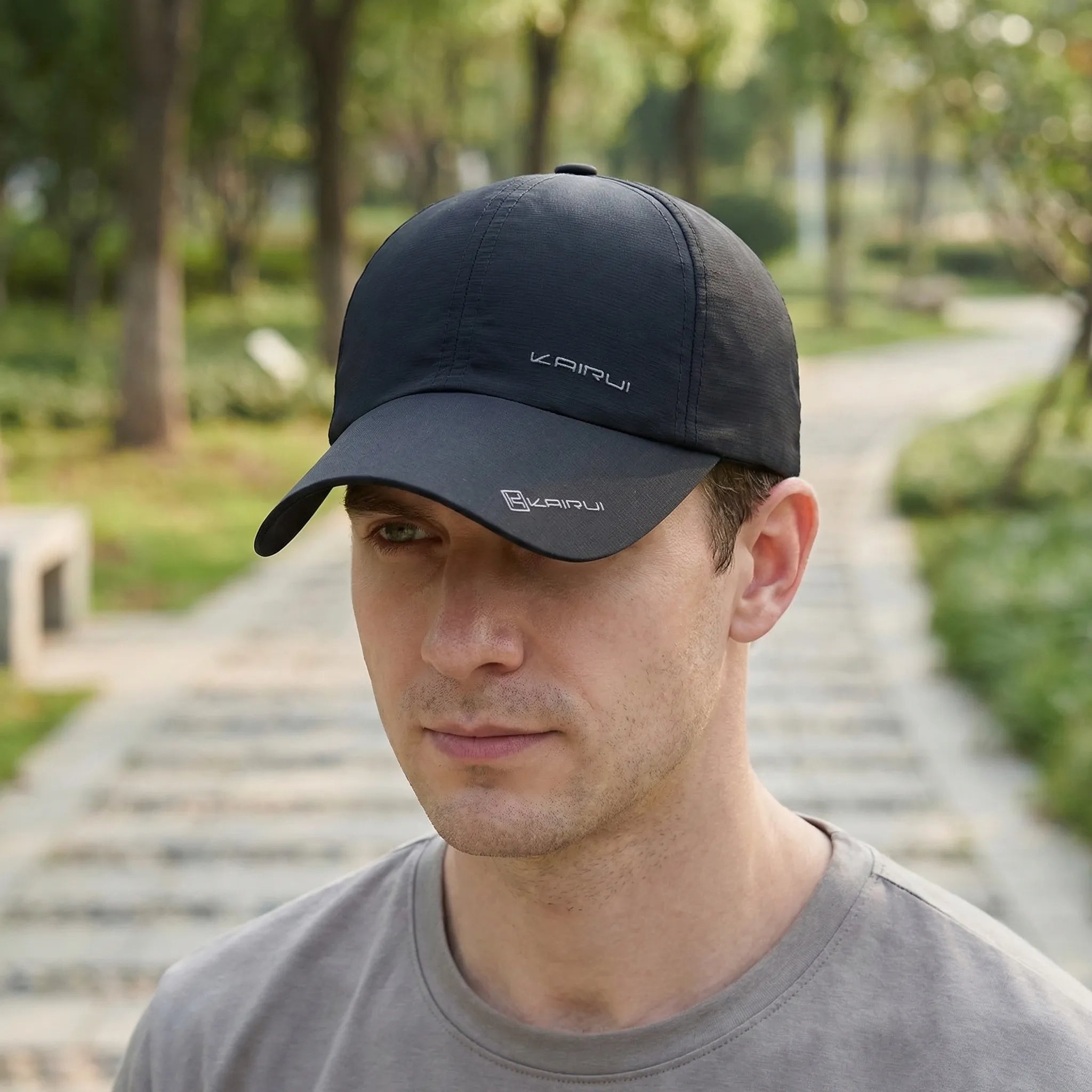 Unisex baseball cap with adjustable snapback closure and curved structured visor