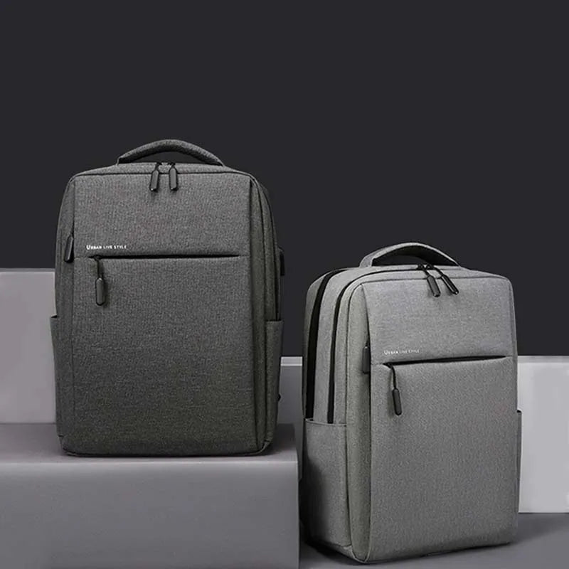 Water-resistant laptop backpack with padded compartment and shoulder straps