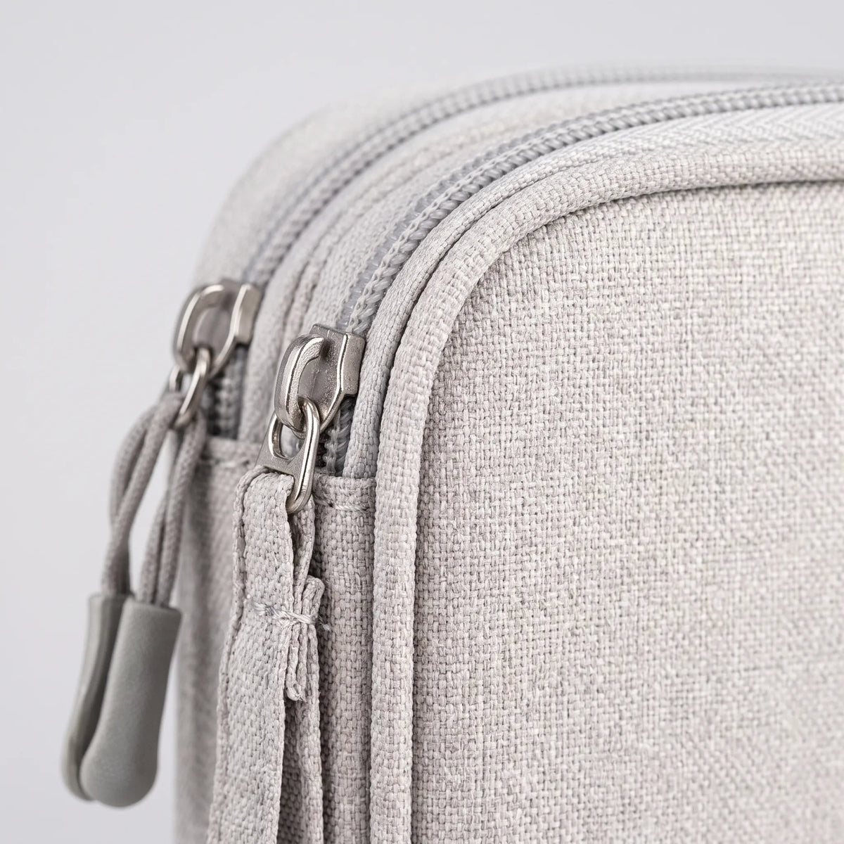 Travel accessories tech organizer with adjustable dividers and water-repellent shell